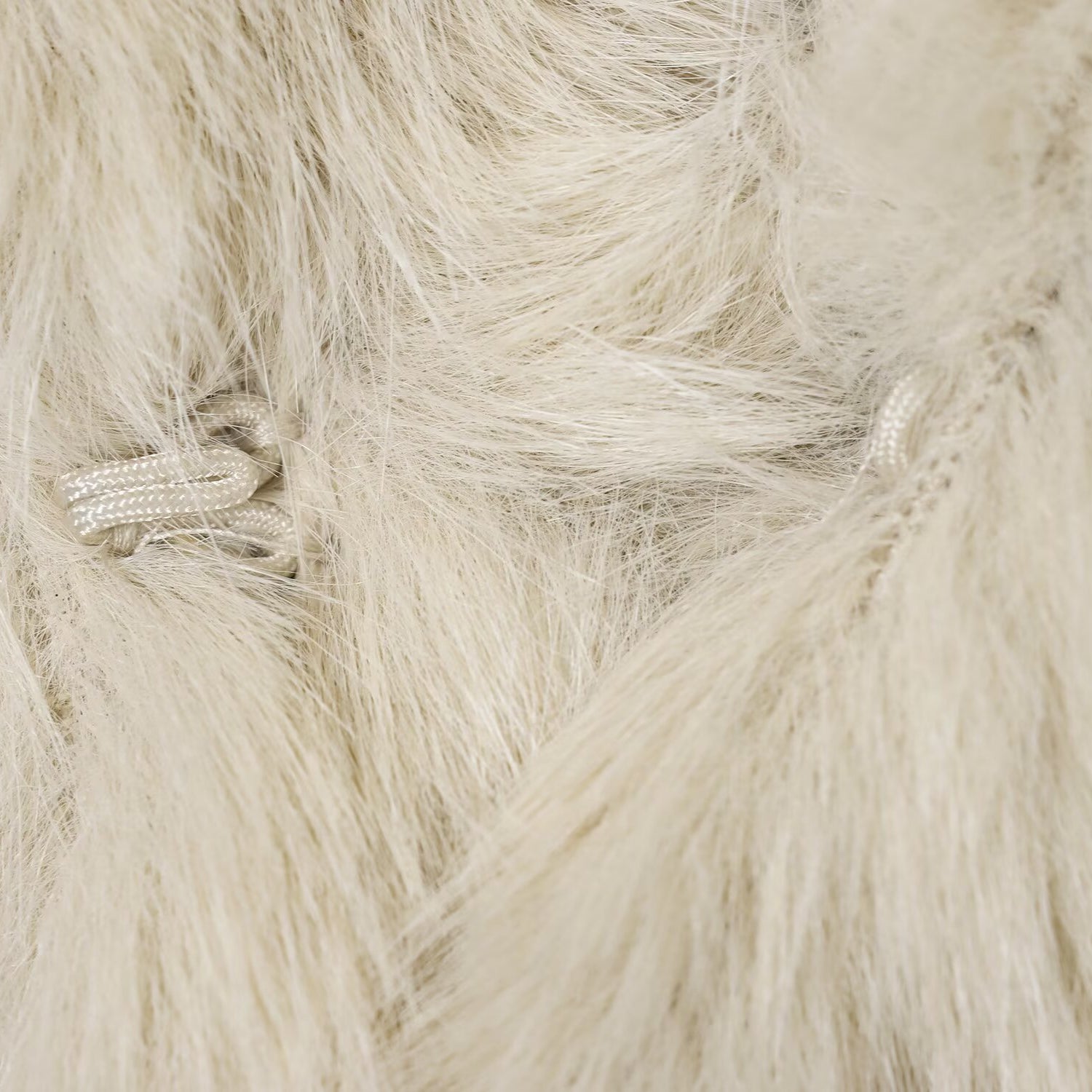 Cream faux fur throw blanket with textured pile and soft sheen for Langry fashion