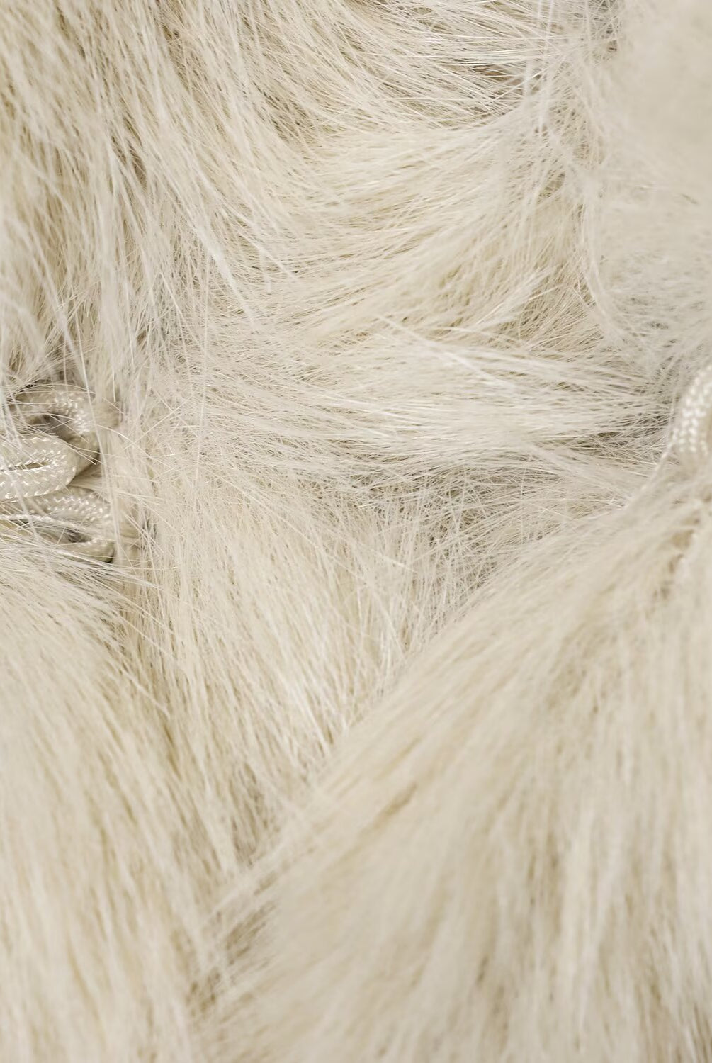 Cream faux fur throw blanket with textured pile and soft sheen for Langry fashion