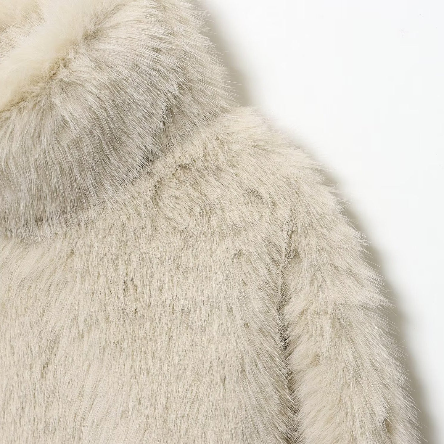 Cream faux fur jacket with hood and textured details