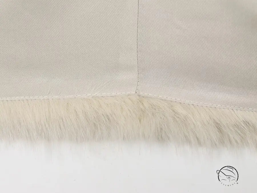 Cream faux fur throw blanket with textured fringe for fur effect short coat