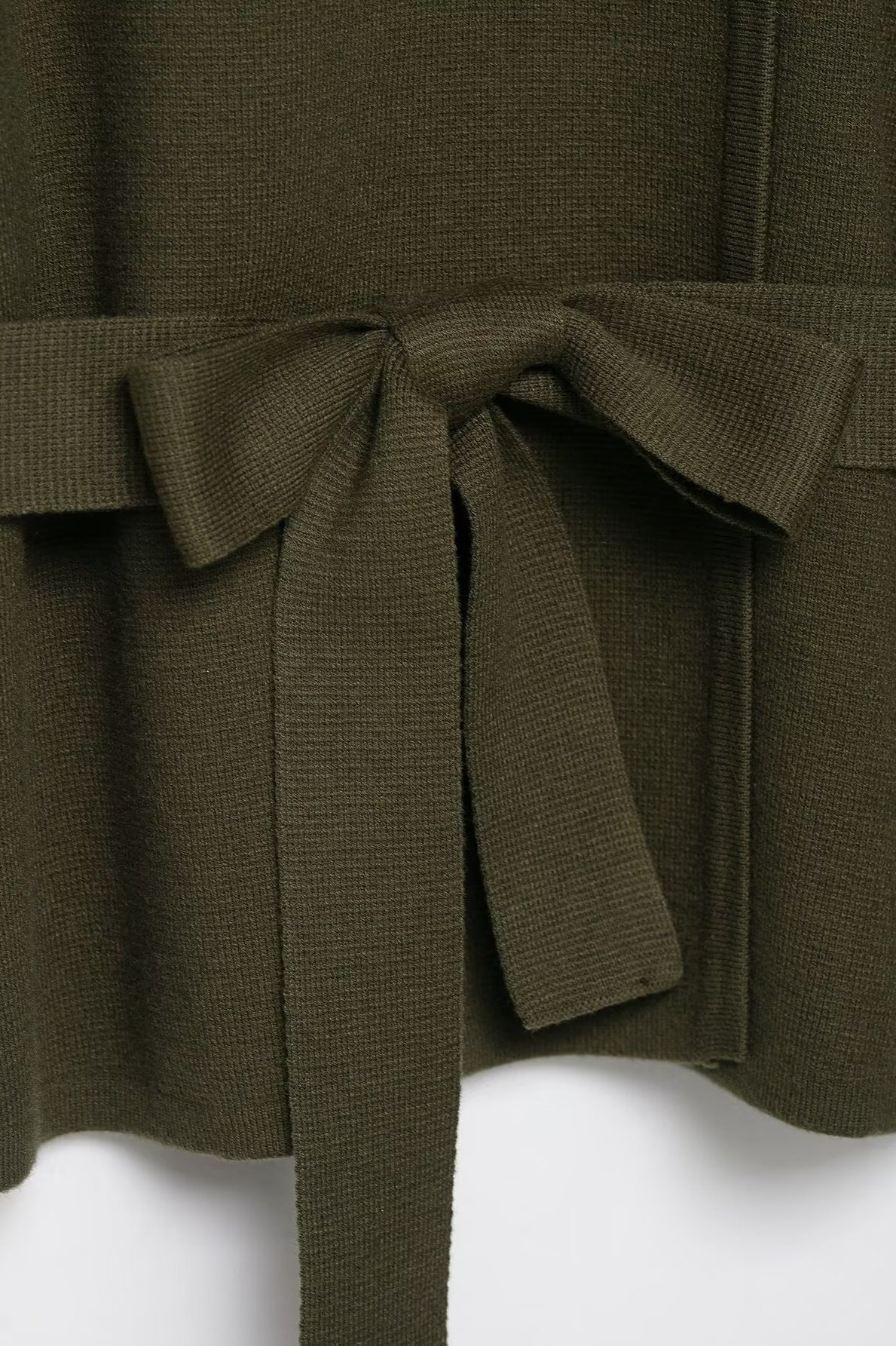 Olive green textured knit sweater with bow tie waistband, regular sleeve fashion