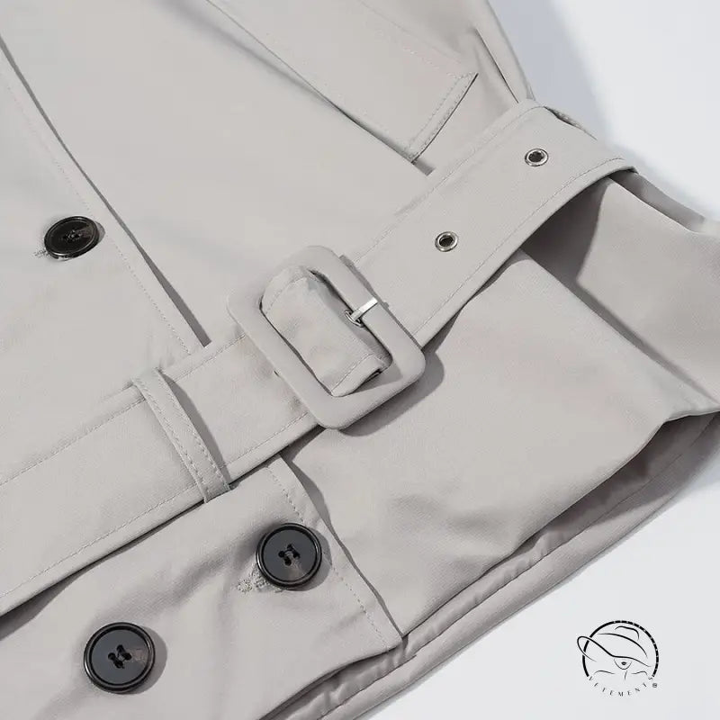 Langry fashion beige trench coat with black buttons and silver buckles