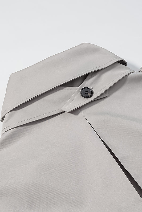 Light gray langry fashion shirt with black buttons in loose long sleeve coat design