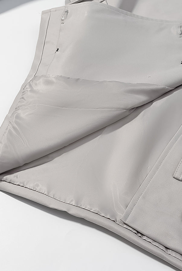 Light gray langry fashion puffer jacket with black buttons and white trim