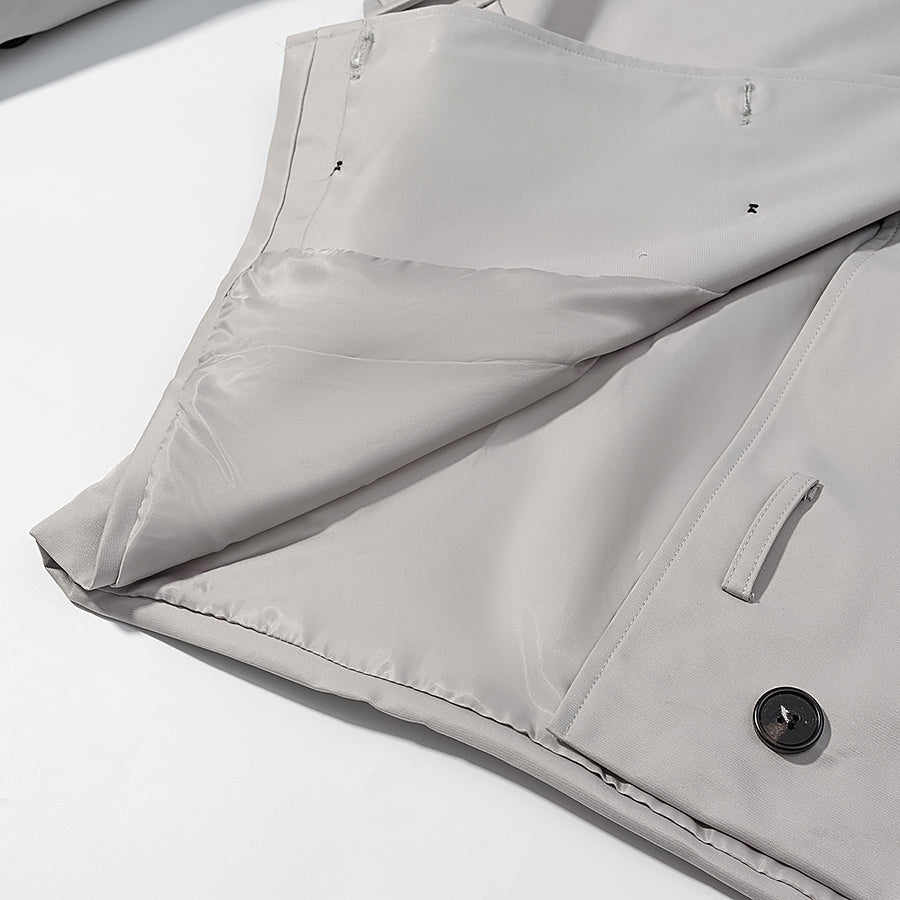 Light gray langry fashion puffer jacket with black buttons and white trim