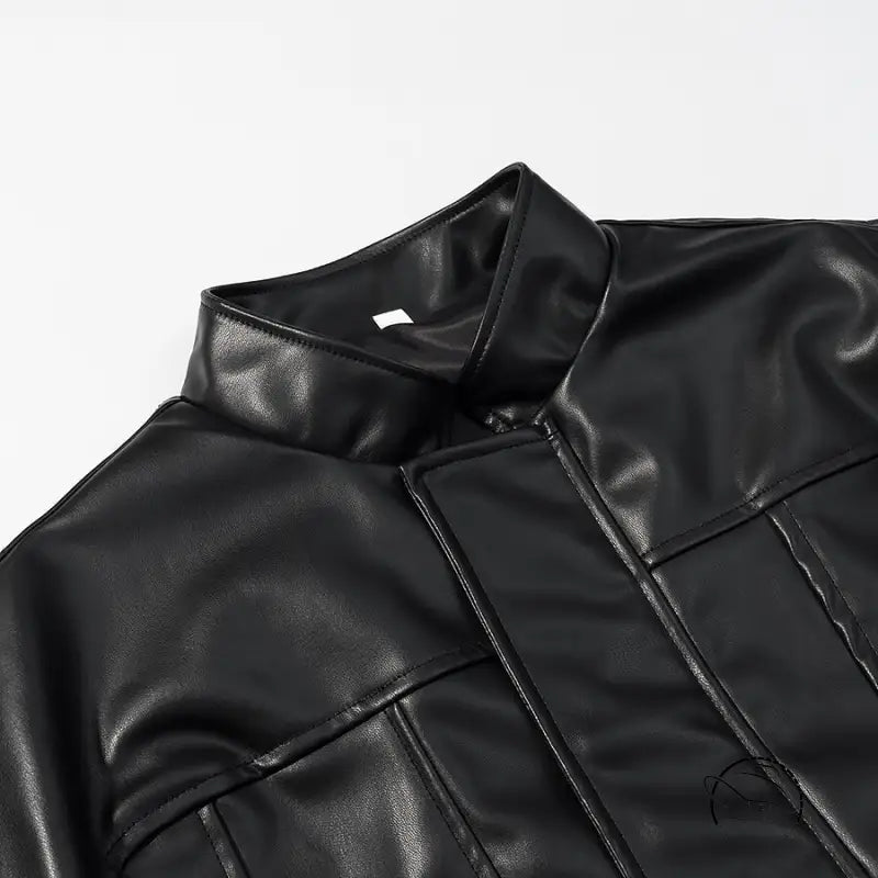 Stylish faux leather jacket with quilted detailing and high collar
