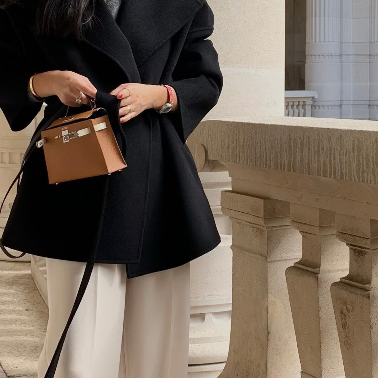 Elegant Langry fashion woolen coat with brown Hermes Kelly bag
