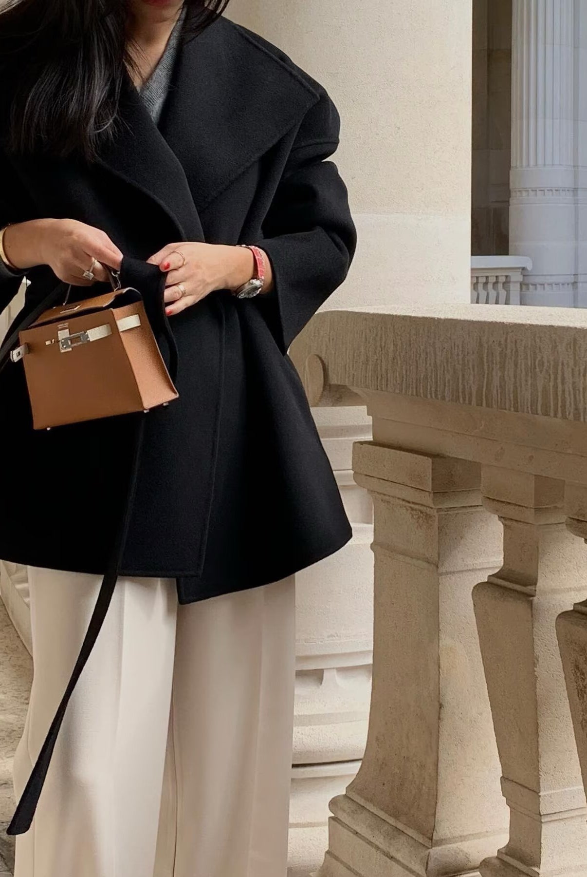 Elegant Langry fashion woolen coat with brown Hermes Kelly bag