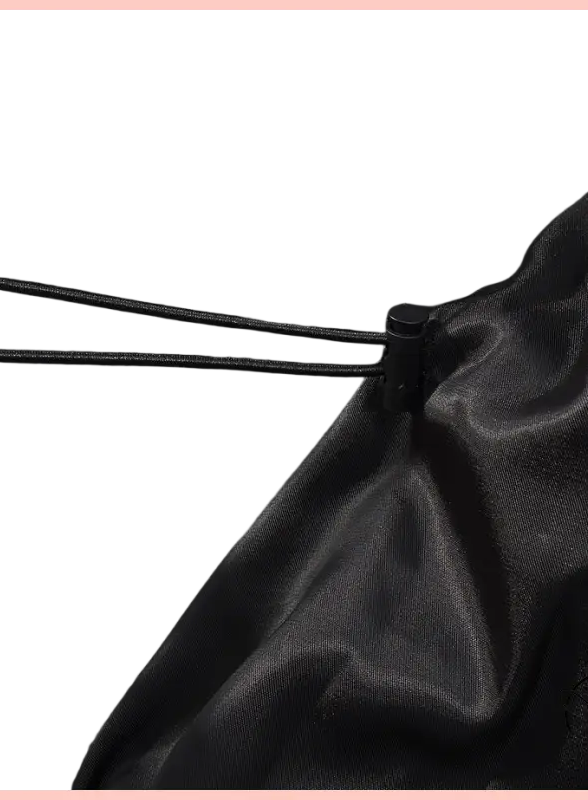 Black shiny faux leather coat with drawstring waist by Langry