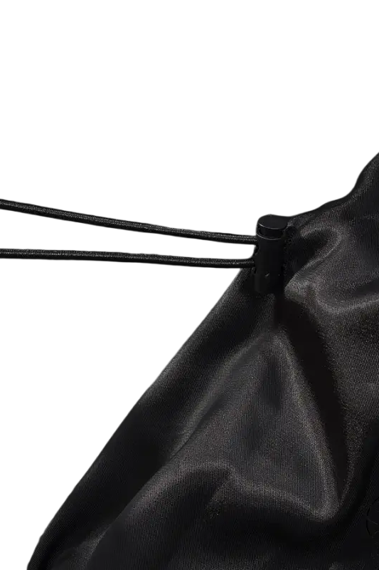 Langry faux leather coat: black shiny jacket with drawstring waist