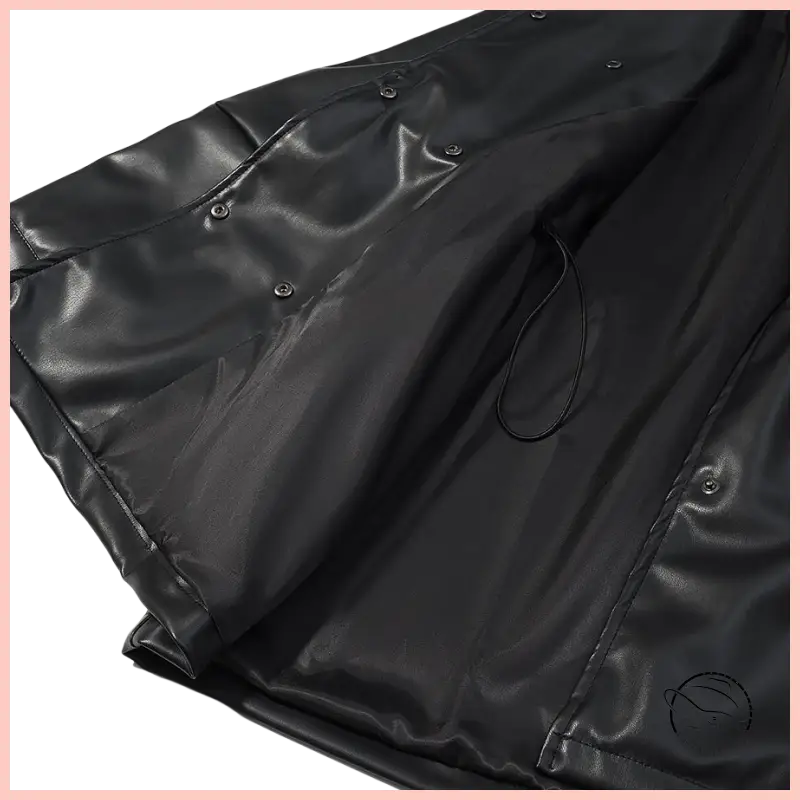 Black glossy faux leather coat with button closure and drawstring hem by Langry