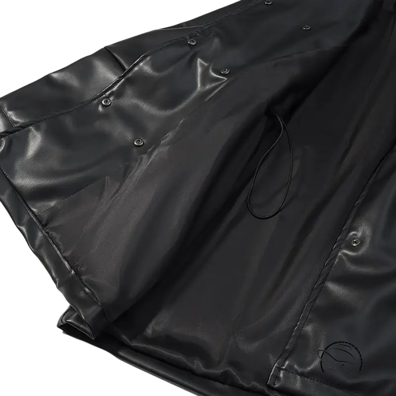 Black faux leather coat with glossy raincoat style, button closure, drawstring hem by Langry