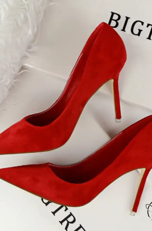 Red suede simple stiletto pumps with gold accents and pointed toes
