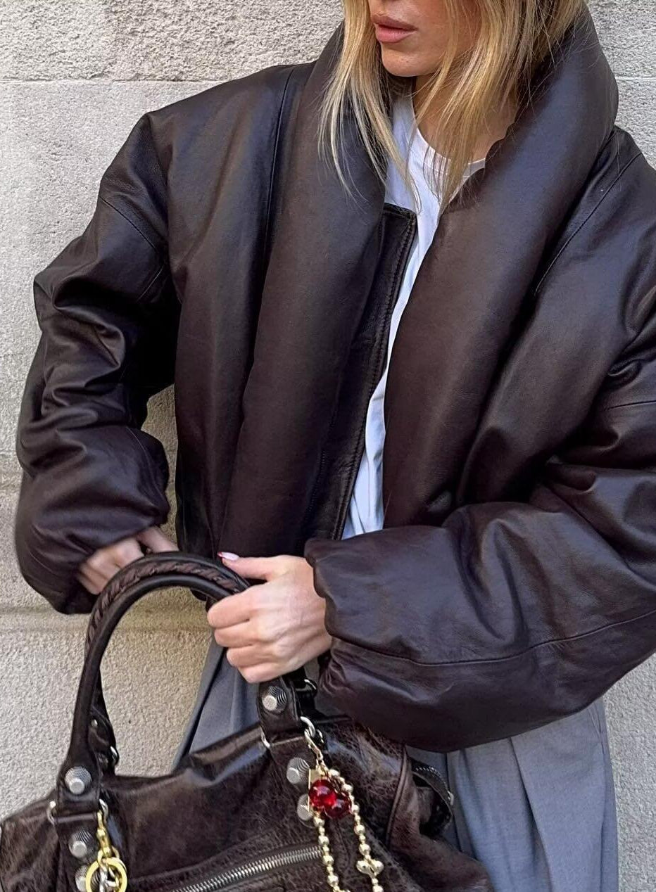 Langry fashion brown leather handbag with gold hardware and red tassel