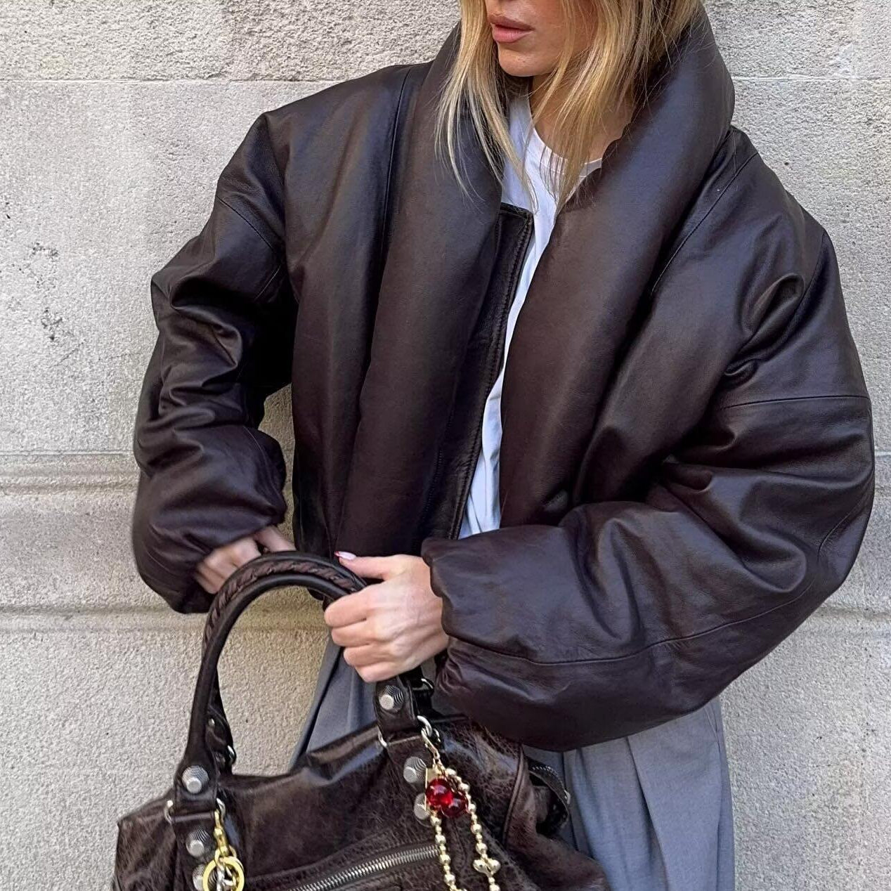 Langry fashion brown leather handbag with gold hardware and red tassel