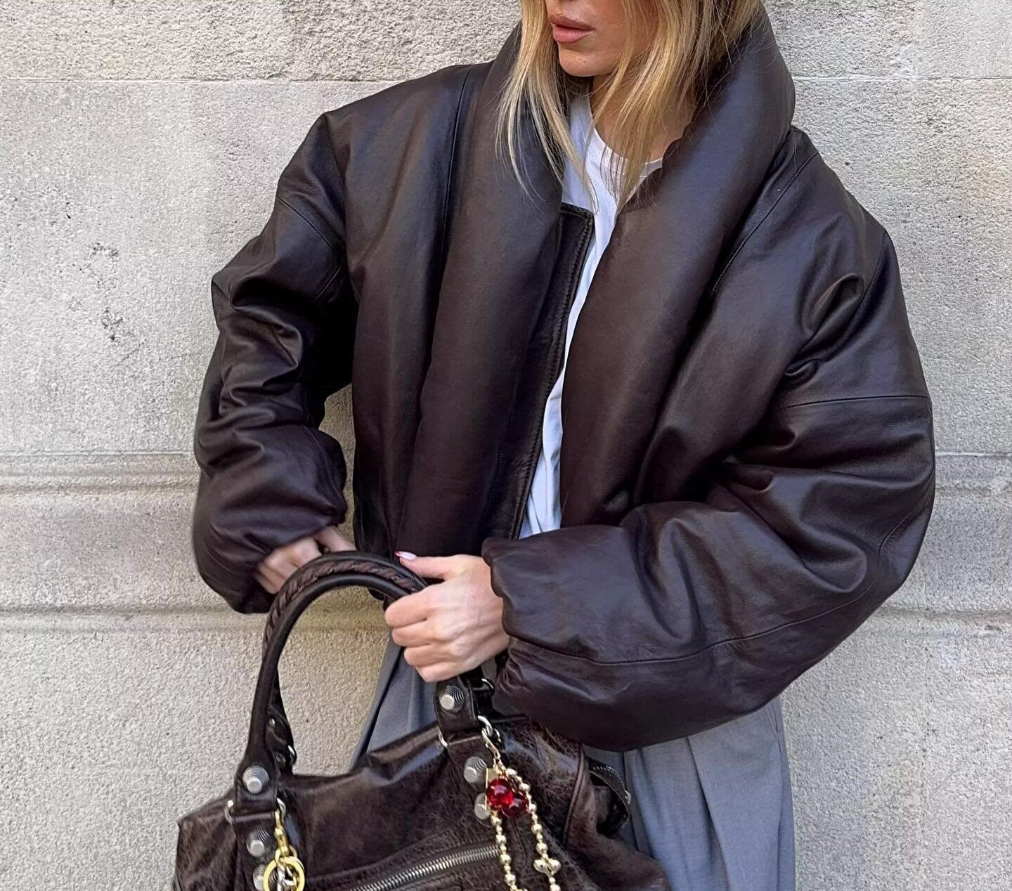 Langry fashion brown leather handbag with gold hardware and red tassel