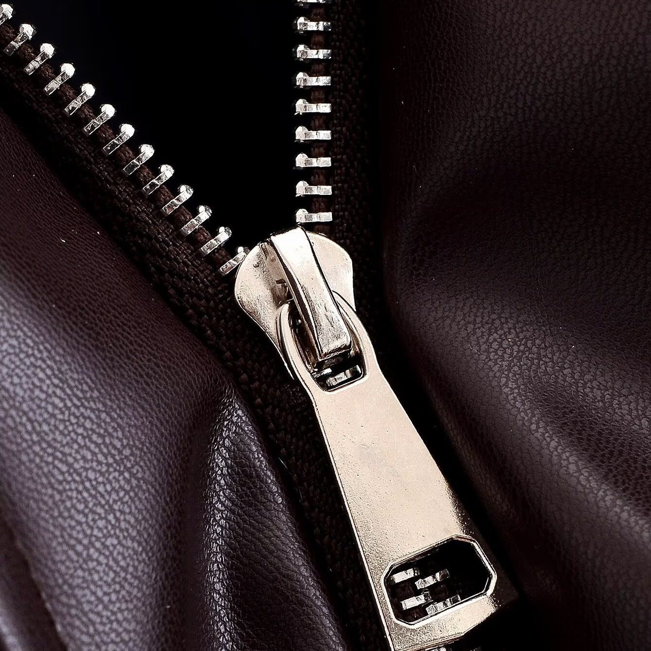 Silver zipper on trendy brown leather langry fashion jacket