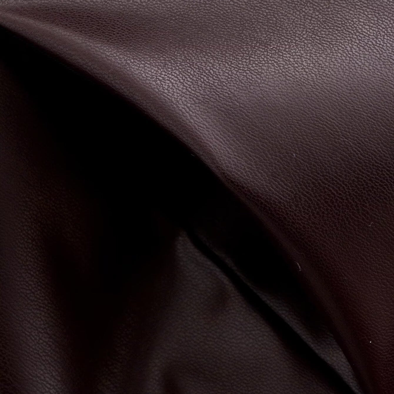 Trendy langry fashion brown leather jacket with smooth texture and subtle sheen