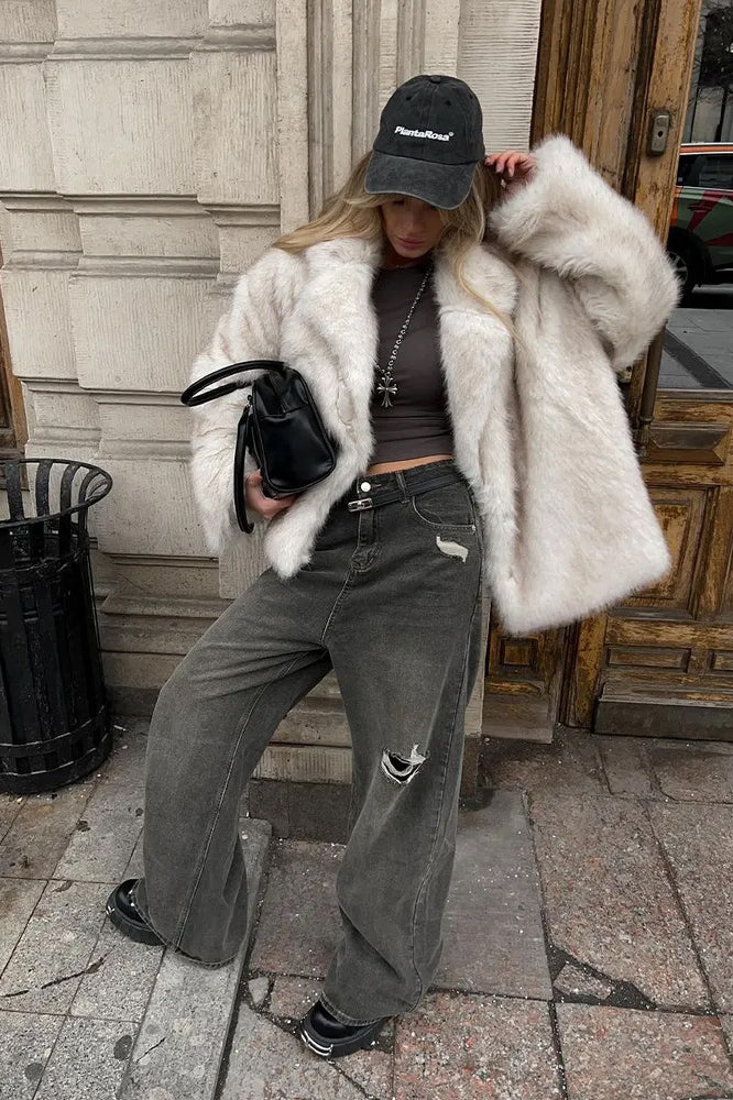 Fashionable white faux fur coat from Langry