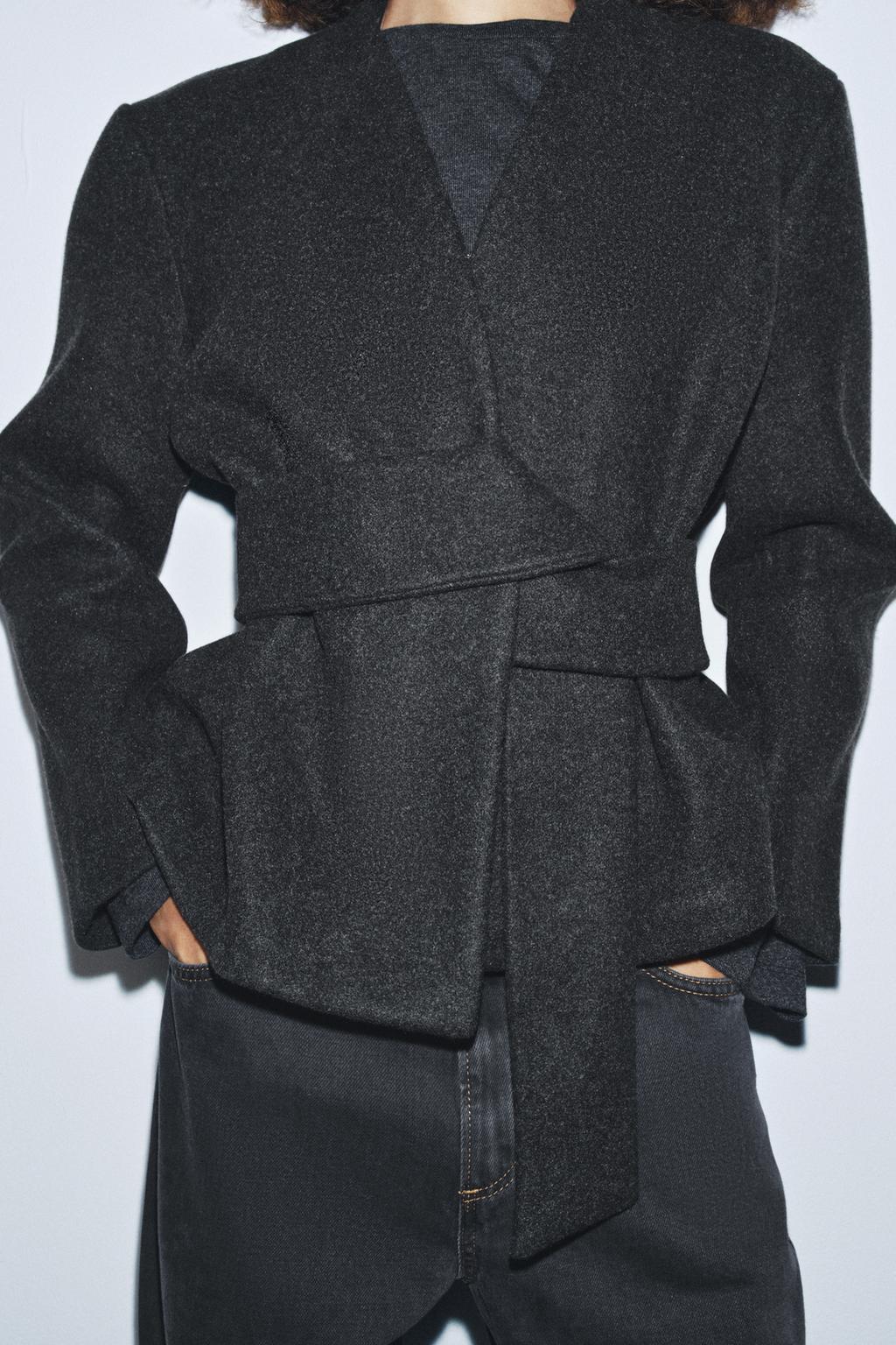 Langry fashion black textured wool blazer with wrap belt and lapel collar in Cozy Soft Coat
