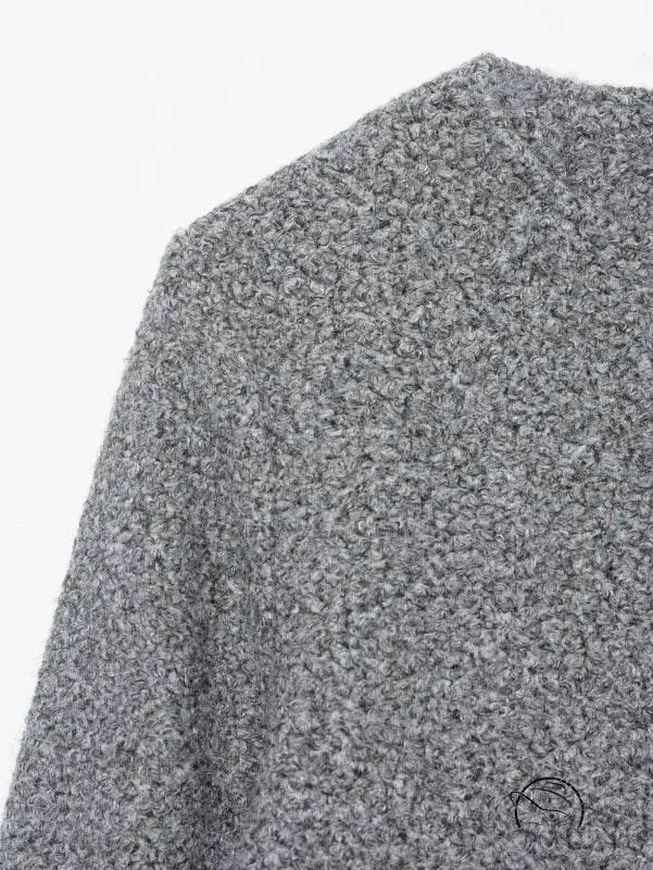 Gray textured sweater with ribbed neckline and cuffs in langry fashion