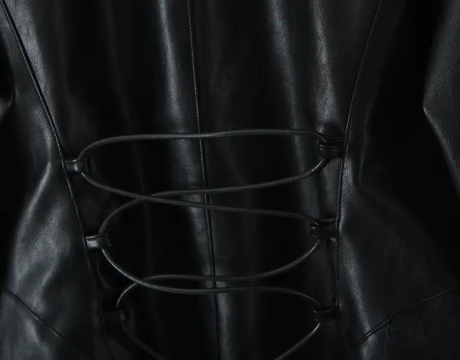 Langry black leather corset with crisscross lacing in winter fur jacket fashion