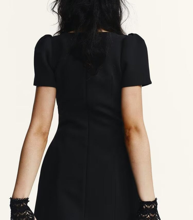 Enchanting Langry black short-sleeved fashion dress with puffed shoulders