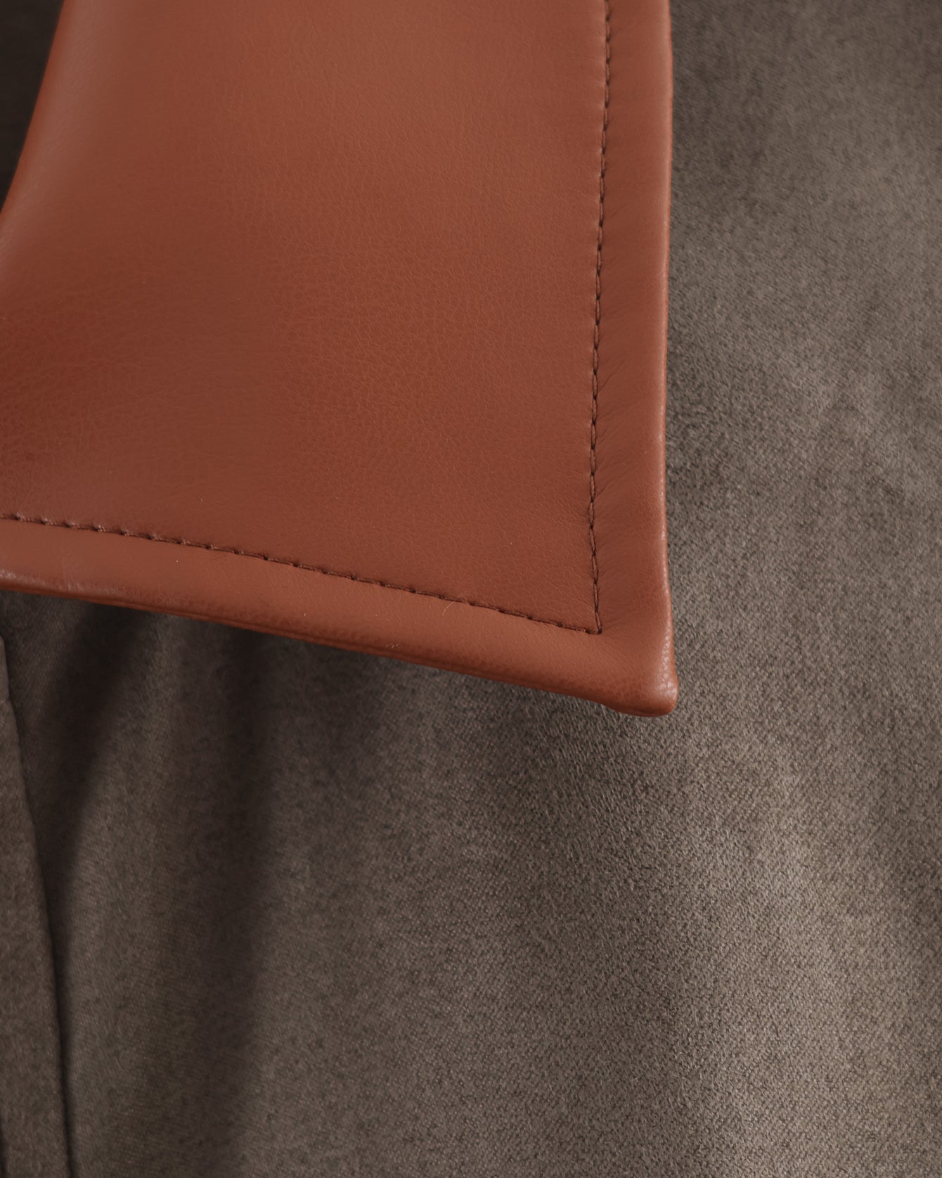 Tan leather wallet corner with stitched edges in Langry fashion ملابس