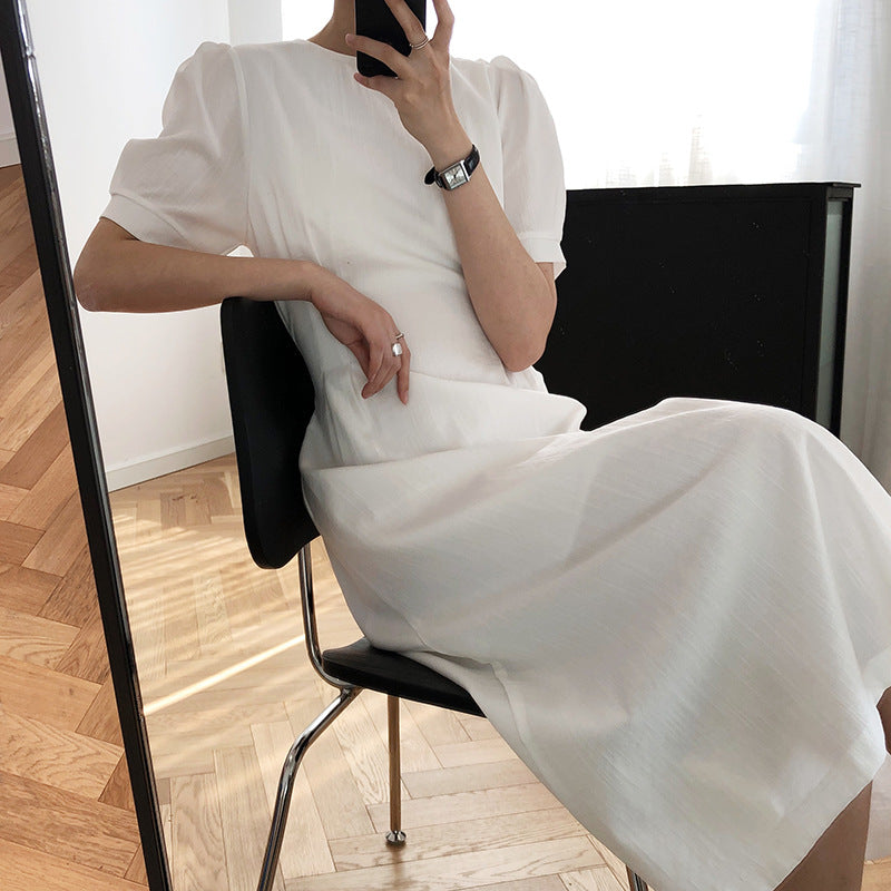 White midi dress with elegant puff sleeve design from French Elegant Puff Sleeve Dress collection