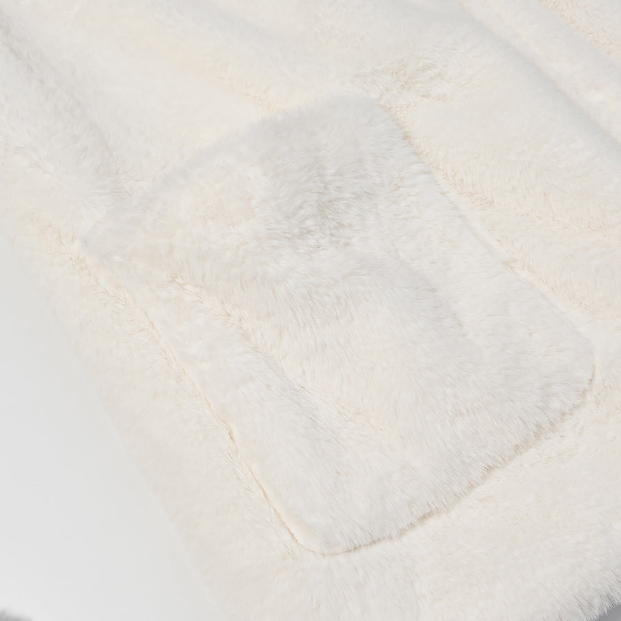 Cream faux fur blanket with plush pocket in Langry fashion