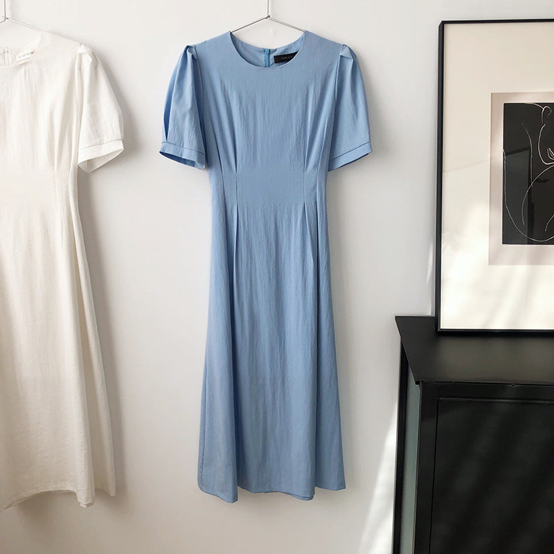Light blue midi dress with french elegant puff sleeve for a sophisticated look