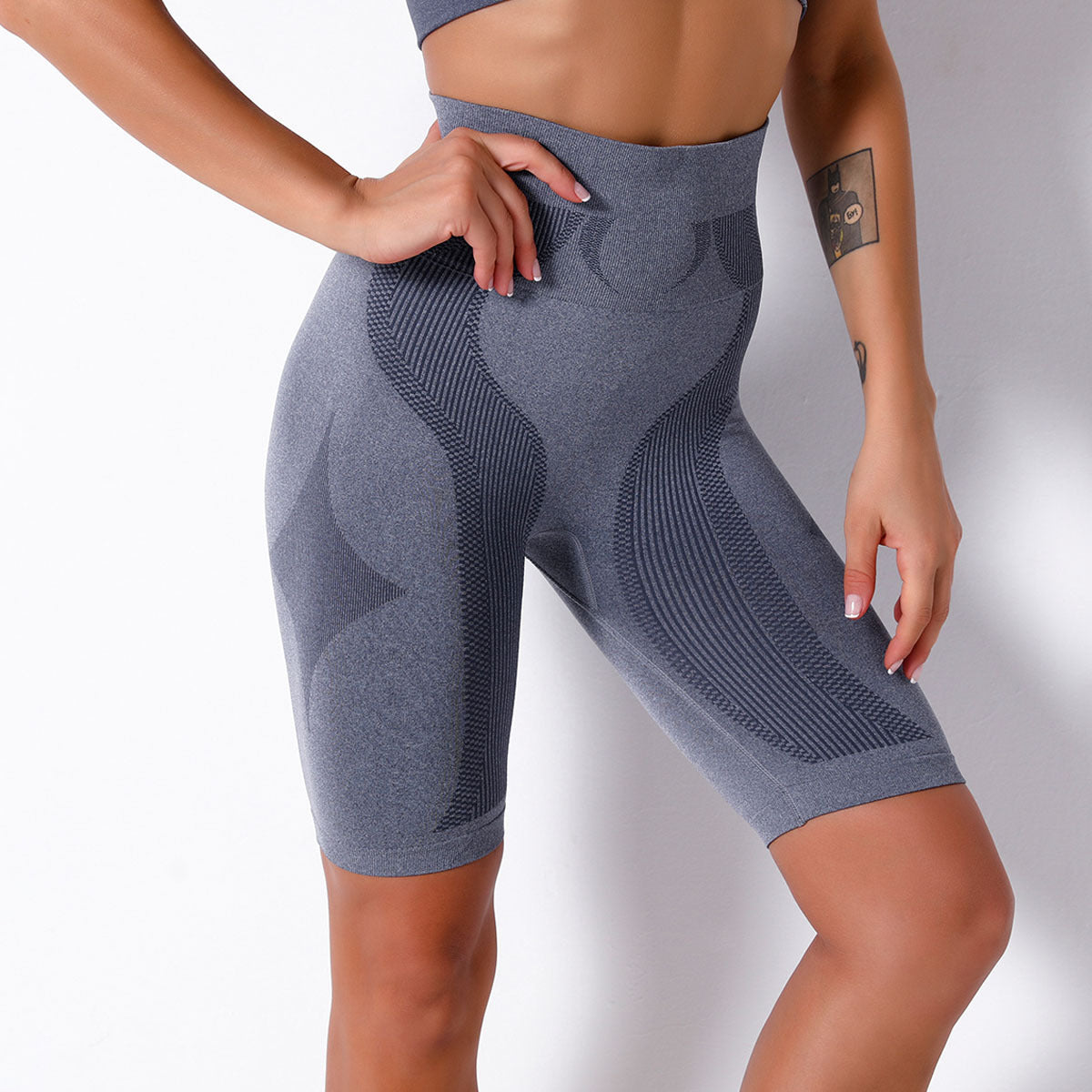 Gray athletic shorts from the Seamless Knit Breathable Striped Shorts Yoga Pants collection