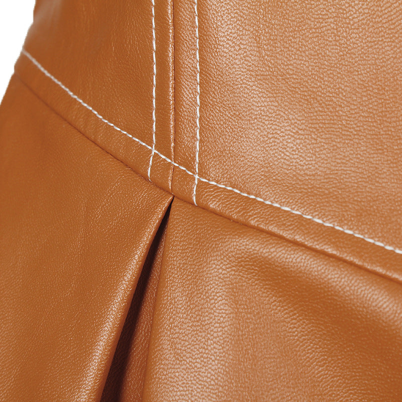 Brown faux leather material with visible stitching and pleat on a Modern Faux Leather Jacket
