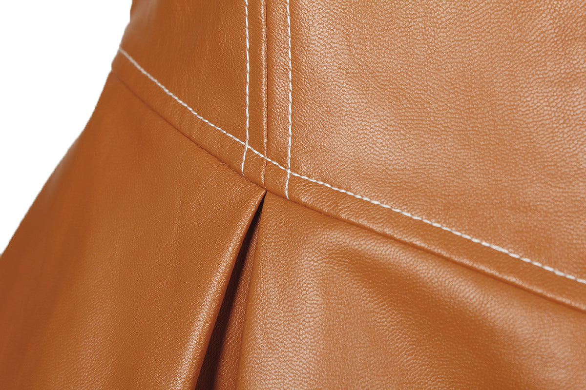 Brown faux leather material with visible stitching and pleat on a Modern Faux Leather Jacket