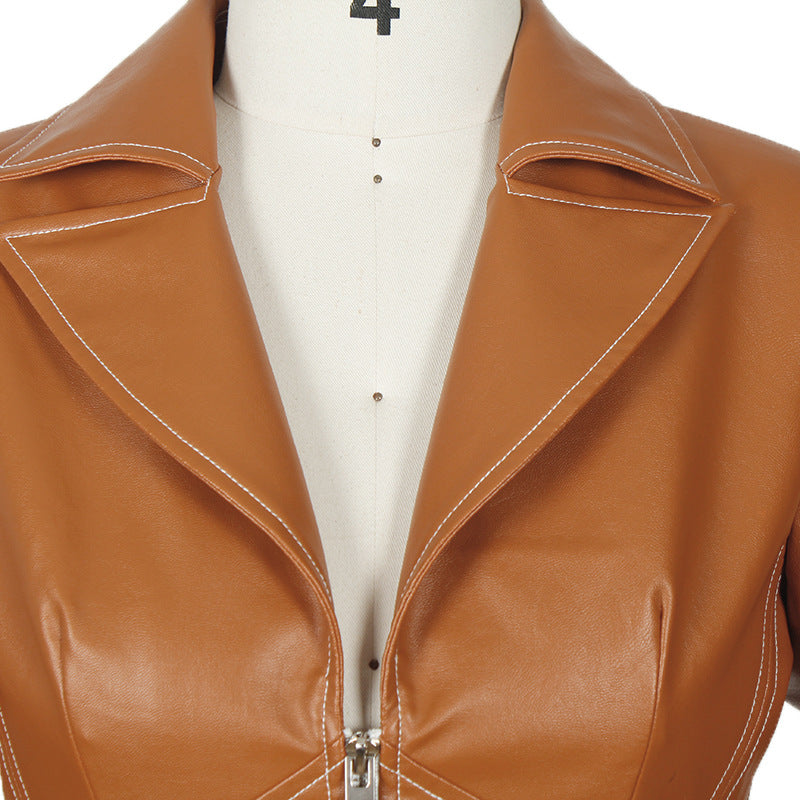 Tan faux leather jacket with zipper front and pointed collar for modern style