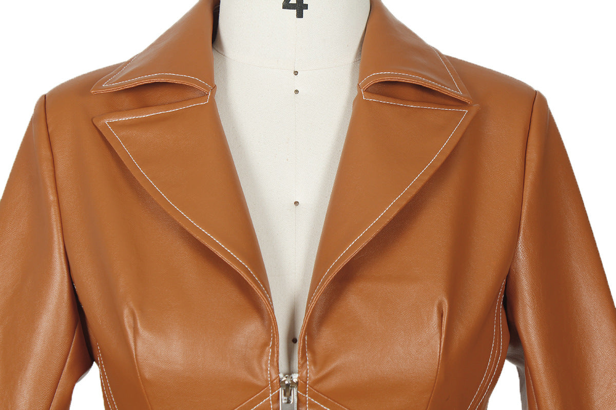Tan faux leather jacket with zipper front and pointed collar for modern style