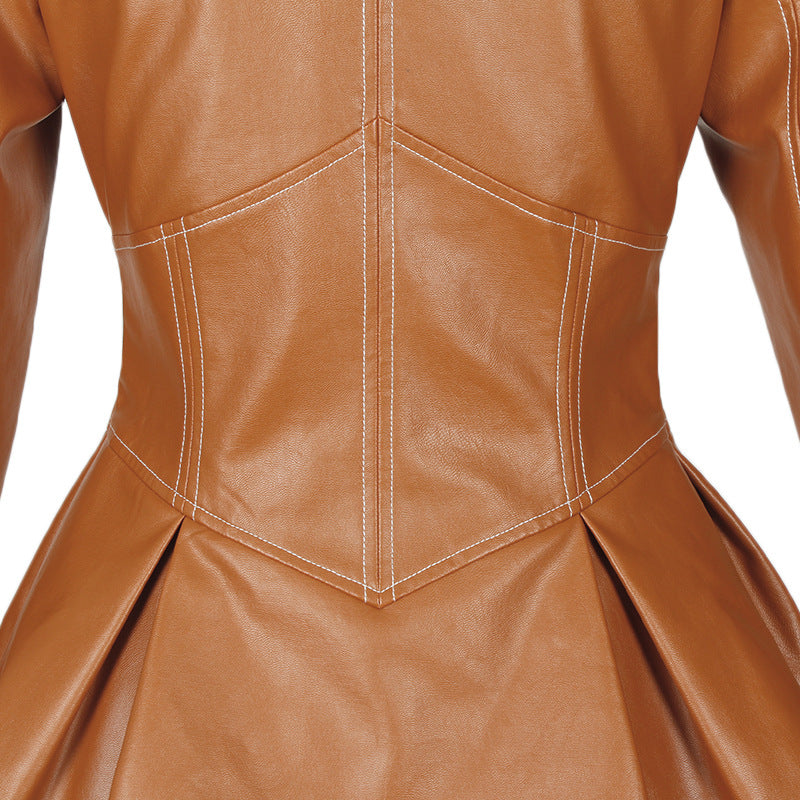 Tan faux leather jacket with fitted waist and pleated bottom detail for modern style
