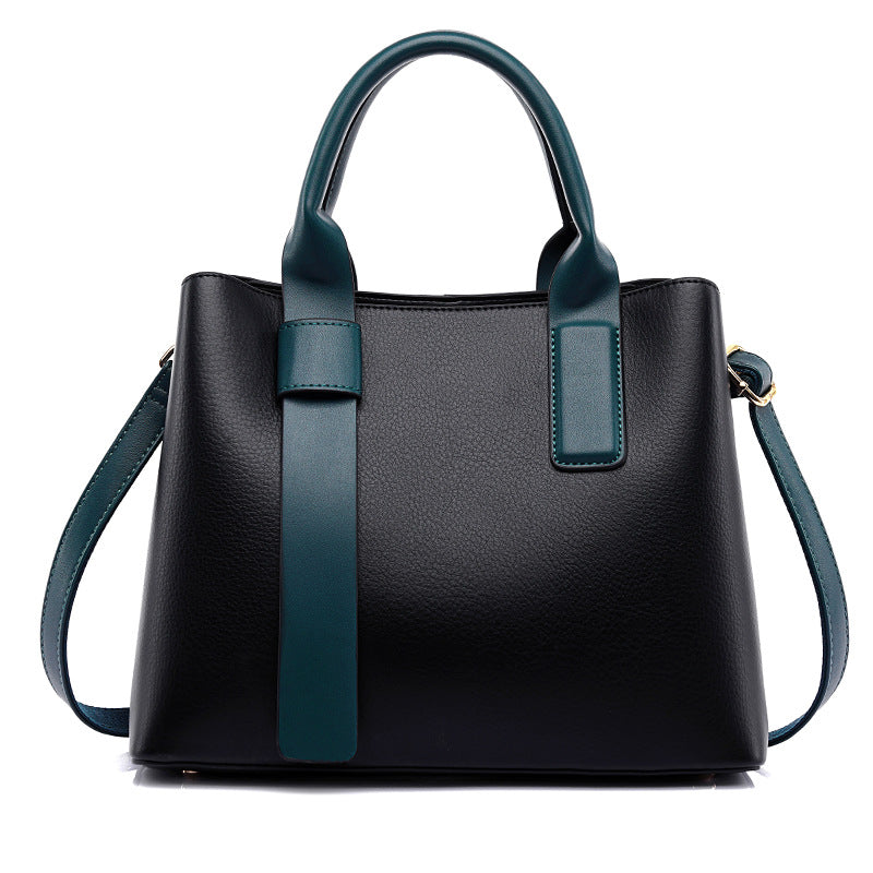 Black leather handbag with teal trim and straps from Langry fashion collection