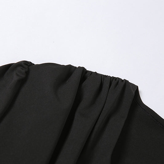 Black fabric with gathered elasticized edge from Spring Fashion Design low cut solid long sleeves bodysuit for women