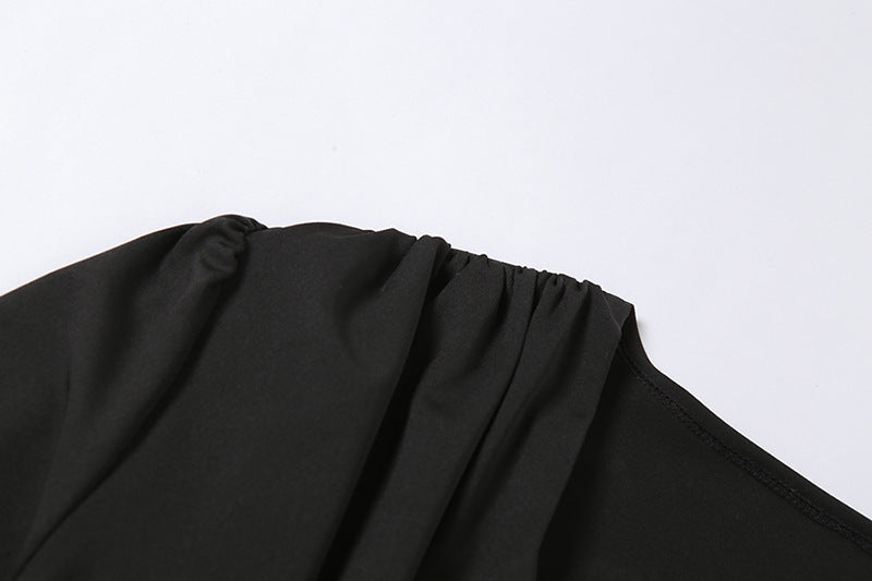 Black fabric with gathered elasticized edge from Spring Fashion Design low cut solid long sleeves bodysuit for women