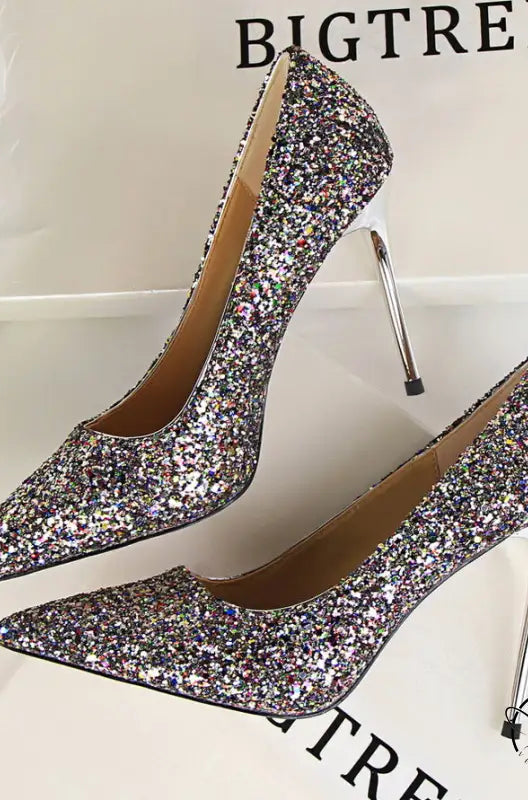 Elegant langry silver glitter high heel pumps with metallic stiletto heels