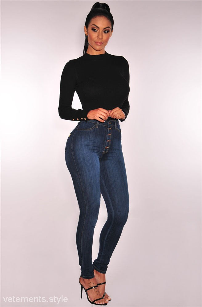 Woman in black top and high-waisted jeans showcasing Skinny Denim Blue Casual style