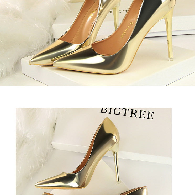 Gold stiletto heels from the Fashionable Metal High Heels collection for stylish ملابس