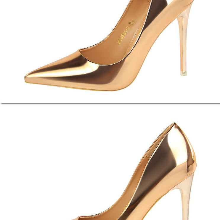 Pair of gold stiletto heels from the Fashionable Metal High Heels collection for stylish ملابس