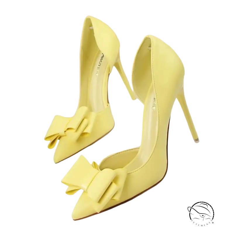 Bright yellow patent leather elegant sweet high-heeled pumps with bow toe