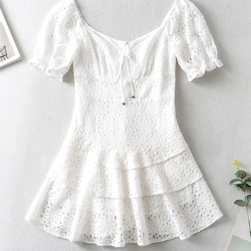 White eyelet tiered dress from the Elegant Short Lace Up Dress collection showed in image