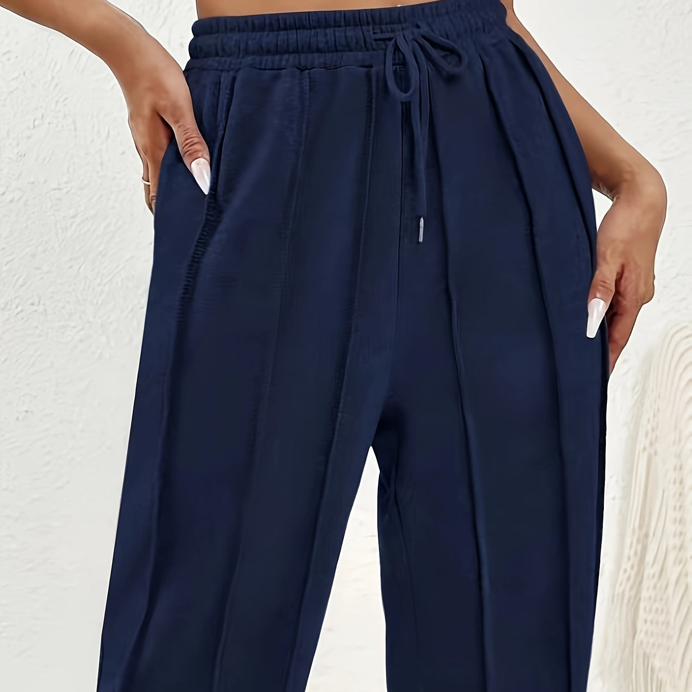 Navy blue wide leg sweatpants with side pockets for casual fashion comfort