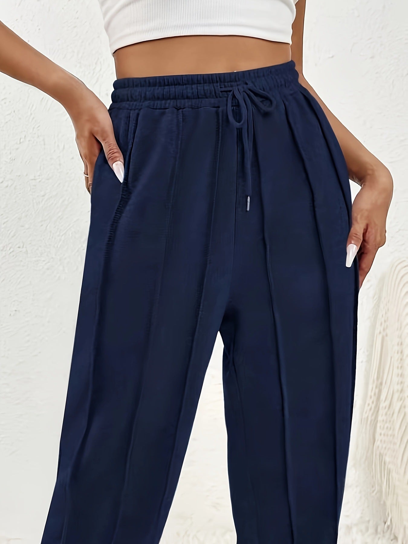 Navy blue wide leg sweatpants with side pockets for casual fashion comfort