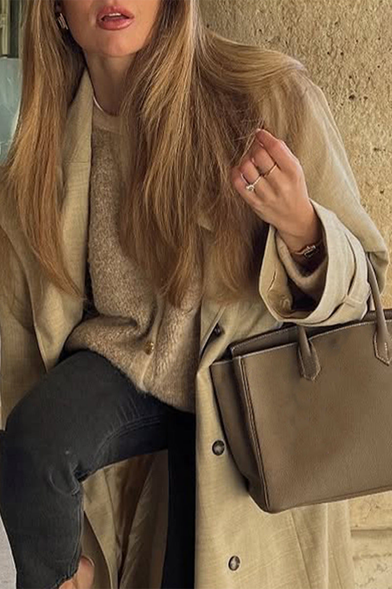 Beige leather tote bag with gold hardware, regular sleeve fashion design