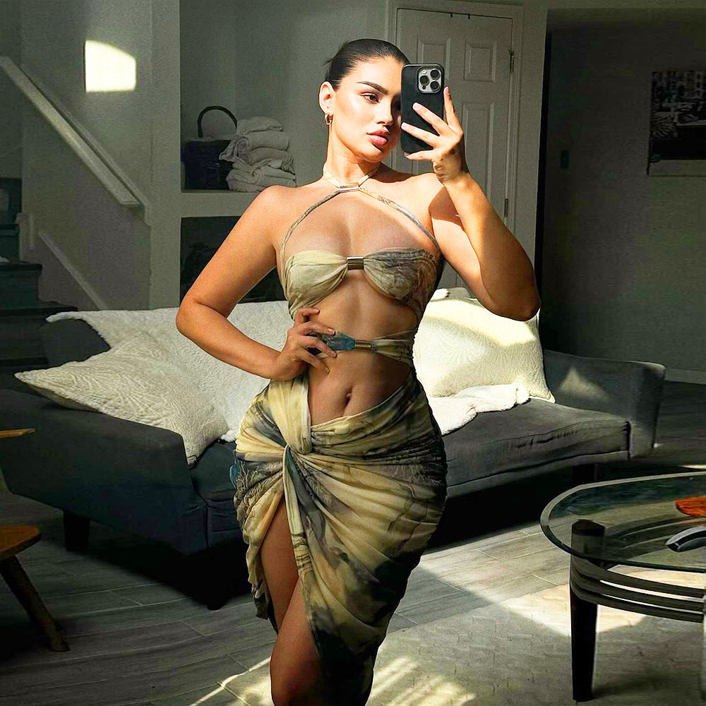 Woman in a floral print split dress showcasing trendy summer langry fashion